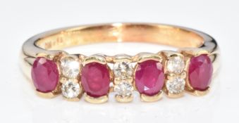 An 18ct gold ring set with rubies and diamonds, 3g, size N/O