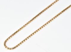 A 9ct gold chain made up of rectangular links, 6.7g, 42cm