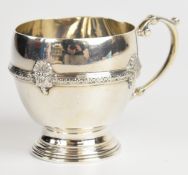 George V hallmarked silver mug with scroll handle and decorated bulbous body, Birmingham 1932, maker