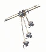Victorian / Edwardian 9ct gold brooch in the form of a four leaf clover / shamrock, set with an