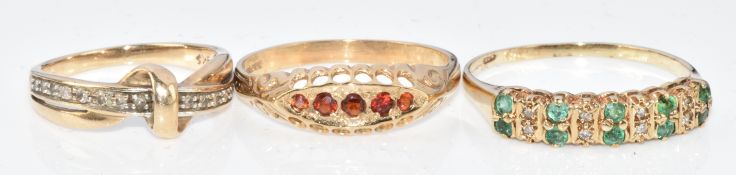 Three 9ct gold rings set with emerald and diamonds, garnets and diamonds, 5.6g, size O, T & J