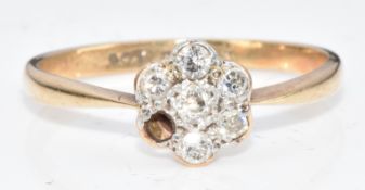 A 9ct gold ring set with diamonds in a cluster (one missing), 1.5g, size O
