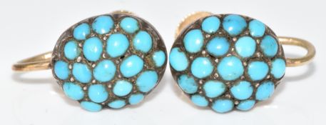 A pair of Victorian yellow metal earrings set with turquoise cabochons, 3.7g (test as 9k)