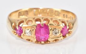 An 18ct gold ring set with three pink sapphires and diamonds, Birmingham 1911, 2.6g, size N