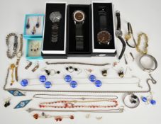 A collection of jewellery including silver christening bangle, silver rope twist bracelet, four