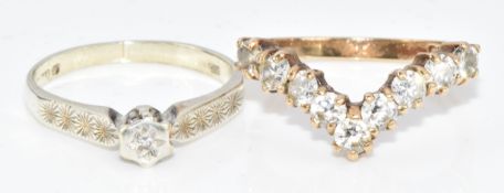 A 9ct gold ring set with cubic zirconia and a 9ct gold ring set with a diamond, 4.9g, size M/N & L