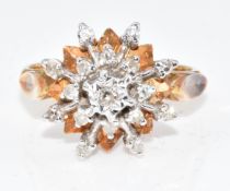 An 18ct gold ring set with diamonds in a snowflake cluster, 4.2g, size H/I