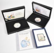 Three Mint Editions Peter Rabbit silver items comprising two medals and an ingot, weight of all