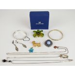 Three silver pendants set with pressed amber, synthetic opal and paste, marcasite earrings,
