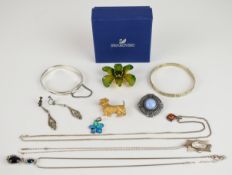 Three silver pendants set with pressed amber, synthetic opal and paste, marcasite earrings,