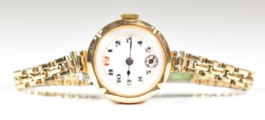Swiss 9ct gold ladies wristwatch with subsidiary seconds dial, blued hands, black Arabic numerals,