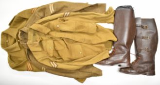 Three British battle dresses / tunics with ranks and insignia, one 1949 pattern dated 1951, and some