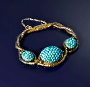 Victorian bracelet made up of fancy links and three domes set with turquoise cabochons, with a