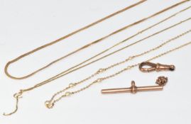 A c1900 9ct rose gold T bar and dog clip (5.8g), 9ct gold chain (2.5g, 44cm), 9ct gold necklace