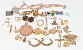 A 9ct gold heart charm (0.5g), 9ct gold back and front locket, a pair of 9ct gold faceted