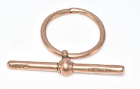 A 9ct gold T bar and loop, 5g