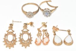 Three pairs of 9ct gold earrings comprising opal set, cameo and floral design and two 9ct gold rings