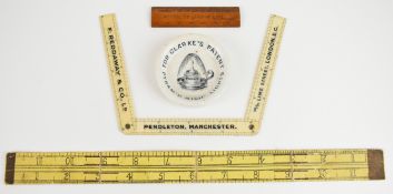Advertising pin dish and rulers comprising pictorial 19thC Charles patent pyramid night light,