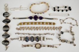 Eleven silver bracelets including pearl and abalone, fossilised fish, amethyst, Rhona Sutton charm