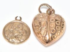 A 9ct gold St Christopher charm and 9ct gold heart pendant, 1.3g