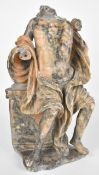 Carved marble semi clad Roman figure wearing a toga and leaning against a pillar, probably early