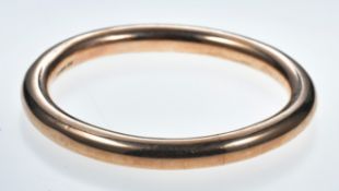 A 9ct rose gold flapper bangle, Birmingham 1915, 20.3g