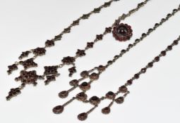 Two Victorian necklaces and a brooch set with Bohemian cut garnets