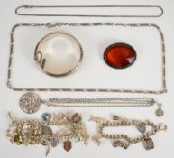 A collection of silver jewellery including Clogau pendant in original box, bangle, two charm