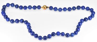 A beaded lapis lazuli necklace with 9ct gold clasp, 41.6g, 44cm, beads approximately 8.2mm each
