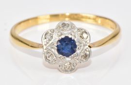 Art Deco 18ct gold ring set with a sapphire surrounded by diamonds in a floral platinum setting, 2.