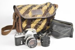 Nikon F 35mm SLR camera with eye level prism finder, Nikkor-S 1:1.4 f=50mm lens, Komura Telemore