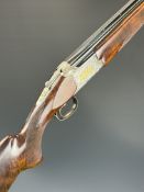 Browning Grade 6 12 bore over and under ejector shotgun with two sets of Teague multi-choke