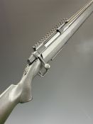 Browning A-Bolt 7mm Remington Magnum bolt-action rifle with composite stock, textured semi-pistol