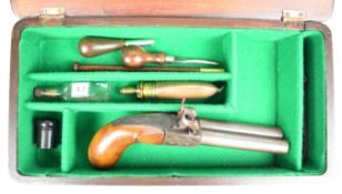 Unnamed double barrelled side by side percussion hammer action pistol with engraved locks,