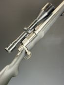 Remington Model 700 .308 Winchester bolt-action rifle with composite stock, semi-pistol grip, raised