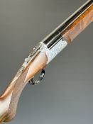 Rizzini Round Body 16 bore over and under ejector shotgun with scrolling engraving to the action,