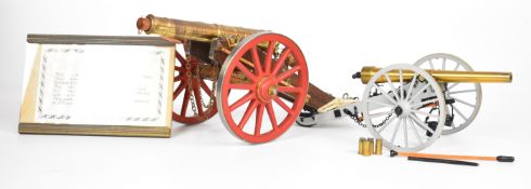 Two model desk or signalling cannon, one a Cornish made British Artillery 12pdr twin trail cannon,