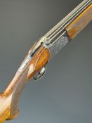 Fabarm Select 12 bore over and under ejector shotgun with ornately engraved locks and named