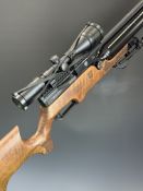 ATA Airborne .22 PCP air rifle with monogrammed semi-pistol grip and forend, raised cheek piece,