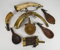 Eight powder and shot flasks and horns including eastern examples with embossed and engraved