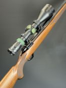 Ruger M77 Hawkeye .204 left-handed bolt-action rifle with chequered semi-pistol grip and forend,