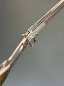 Williams & Powell .410 hammer action shotgun with chequered grip and forend and named 25.25 inch