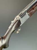 Nikko Shadow Indy 12 bore over and under ejector shotgun with engraved locks, trigger guard,