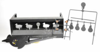 Four self-setting air rifle or pistol targets including Umarex duck target with pellet catcher and a