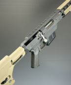 Remington MDT TAC21LA 7mm Rem Mag bolt-action rifle with Magpul PRS composite tactical stock,