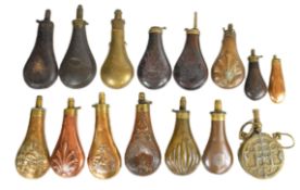 Fifteen copper and brass powder flasks including Bartram & Co, Dixon & Sons, Frith patent, Colt