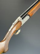 Browning Medallist Sporter 20 bore over and under ejector shotgun with named and ornately engraved