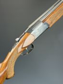Brno Model 501.2 12 bore over and under ejector shotgun with engraved scenes of birds to the action,
