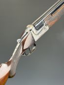Super Saive 16 bore over and under ejector shotgun with engraved action, underside and thumb