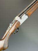 Beretta S687 Sporting 12 bore over and under ejector shotgun with engraved scenes of birds to the